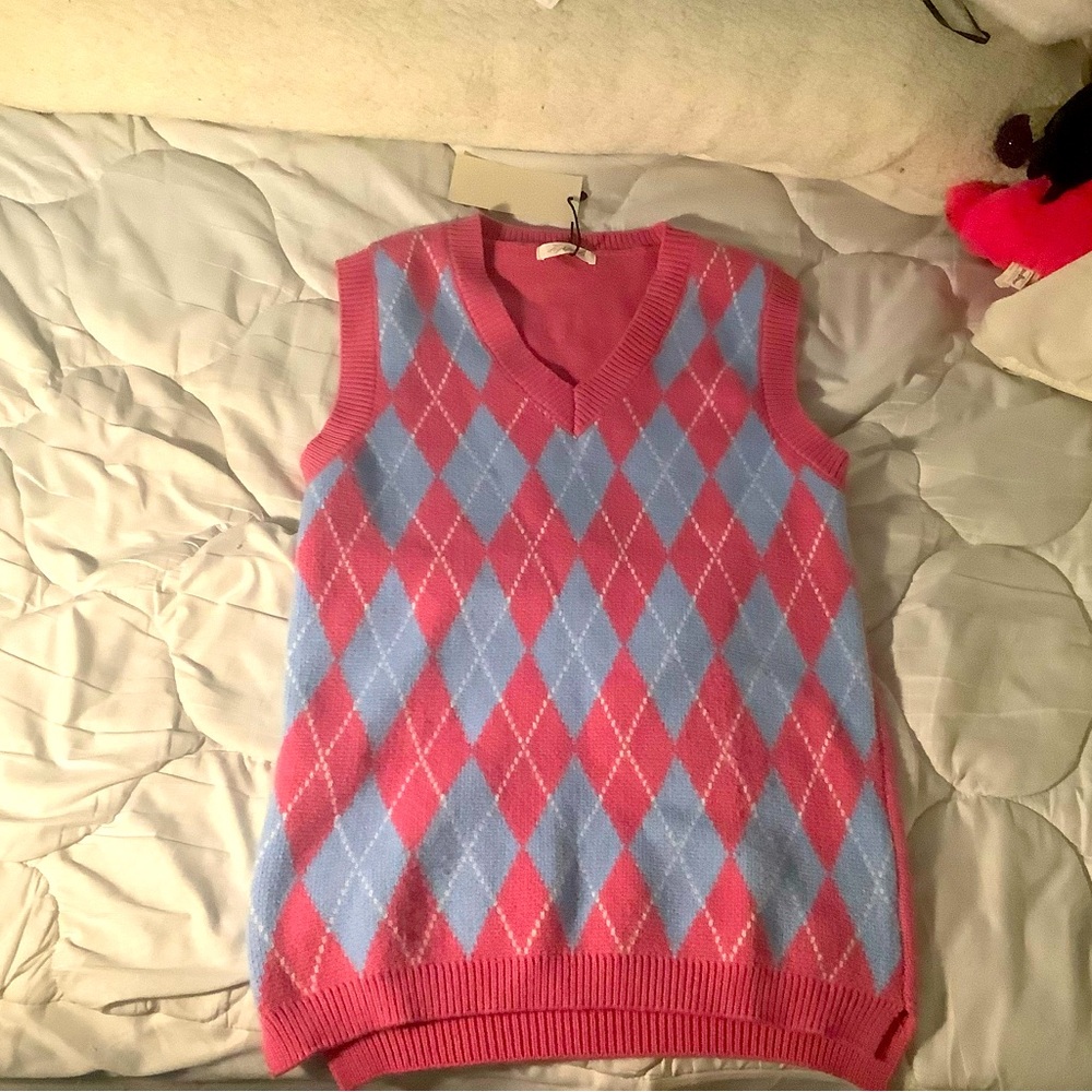 Pink and blue knitted sweater vest